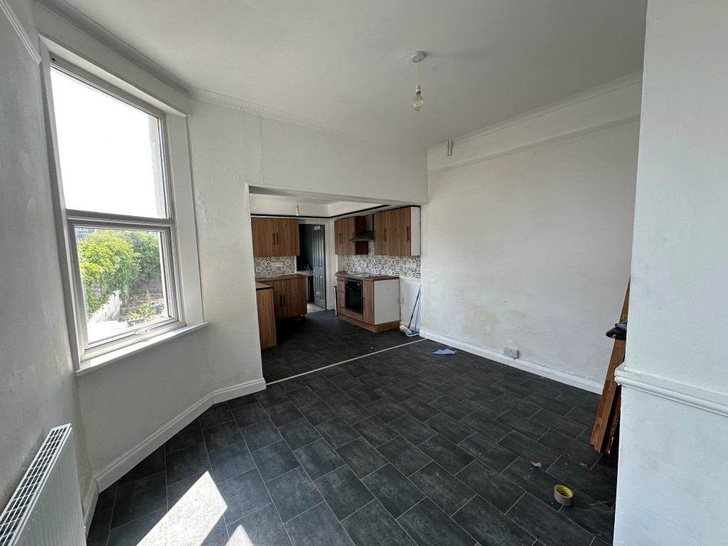 Lot: 103 - THREE-BEDROOM END-TERRACE PROPERTY - Dining Room with kitchen attached